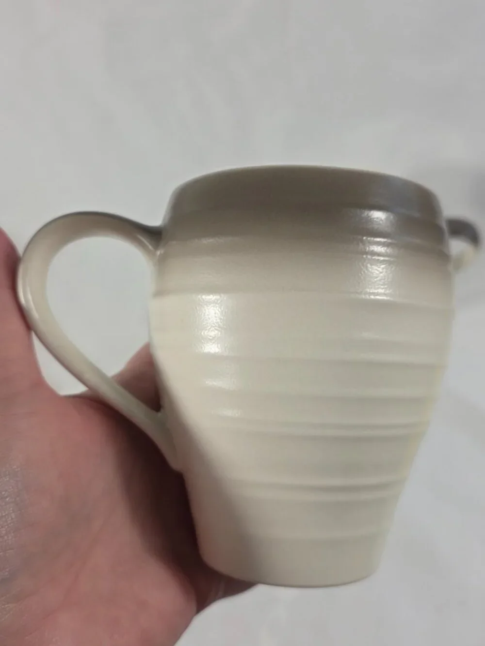 TWO Mikasa Swirl Ombre Mocha Mugs White with Mocha Border Embossed Rings